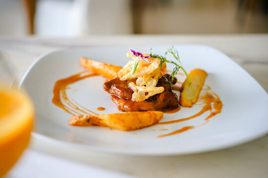 Gourmet Beef Dish with Crispy Garnish