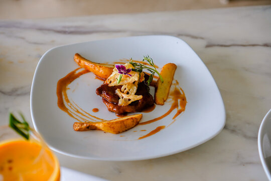 Gourmet Beef Dish with Crispy Garnish