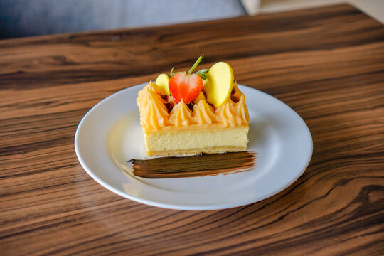 Elegant Dessert with Fruit and Chocolate Garnish