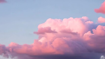Cotton candy clouds fill the gentle blue sky as sun sets, painting everything in shades of rose and tranquility. - Powered by Adobe