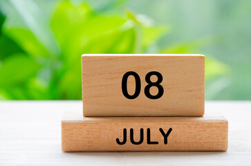 July 8th calendar text on wooden blocks with customizable space for text. Calendar concept