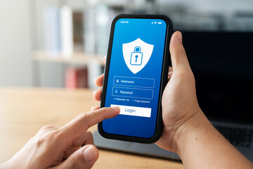 Cyber ​​Security and Data Protection, Businessman Using Smartphone to Encrypt Security to...