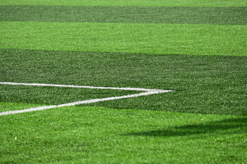 Fototapeta premium artificial green grass background for playground