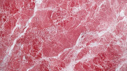 Obraz premium A polished pink marble pattern with radiant white veins and a rich finish.