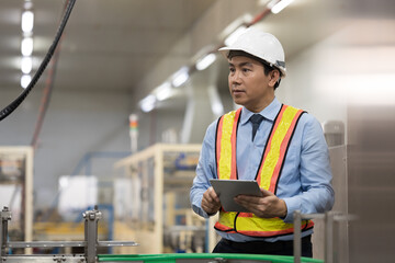 Male engineer, Industry factory, Storage warehouse. Asian male plant engineer working with digital...