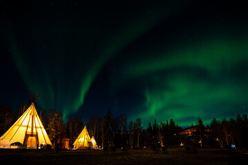 Yellowknife, Canada, offers a stunning display of the northern lights, with mesmerizing green and...