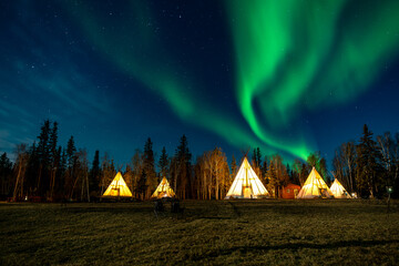 Yellowknife, Canada, offers a stunning display of the northern lights, with mesmerizing green and...