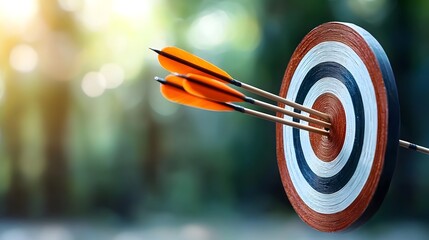 Fototapeta premium Archery arrows hitting a target bullseye