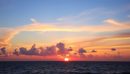 Spectacular Sunset over the Ocean with Vibrant Colors and Dramatic Clouds