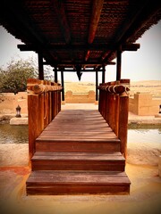 wooden bridge over the river