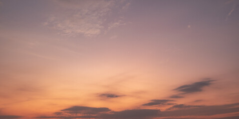  Panoramic view of sunset golden and blue sky nature background.
Colorful dramatic sky with cloud at sunset.Sky background.Sky with clouds at sunset.