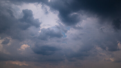 Obraz premium Dark sky with stormy clouds. Dramatic sky rain,Dark clouds before a thunder-storm.