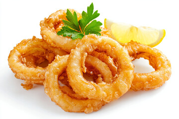 a pile of onion rings with a lemon wedge