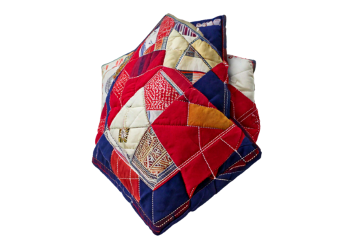 Folded Patchwork Quilt with Red, White, Blue, and Yellow isolated on transparent or white background