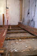 Restoration work in the house to replace old wooden floors. Renovation of residential premises