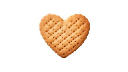 Heart shaped cracker with small holes on a black background