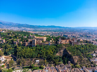 Fototapeta premium Majestic Alhambra Palace - Aerial View of Granada's Historic Moorish Fortress