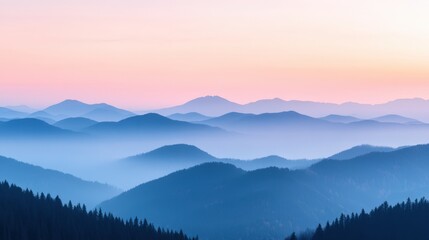 Fototapeta premium Blue mountain ridges in misty landscape against pastel sky at dawn. Serene nature scene for travel, tourism, eco banner, website background with copy space