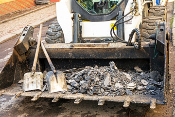 road construction and repair in the city on a rainy day