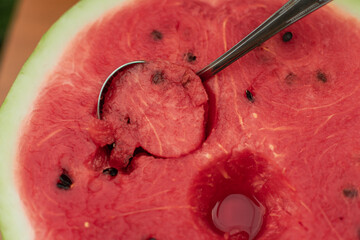 close-up of the flesh of a juicy and ripe red watermelon. a healthy and proper snack. raw food diet	