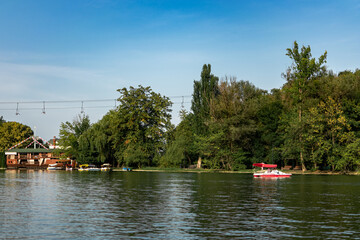 organization of leisure and recreation in summer. a walking and entertainment area by the lake...