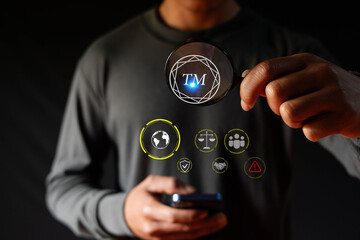 Trademark Registration Concept Copyright Protection Individual Use Magnifying Glass To Focus On Trademark Registration Icon On Virtual Screen