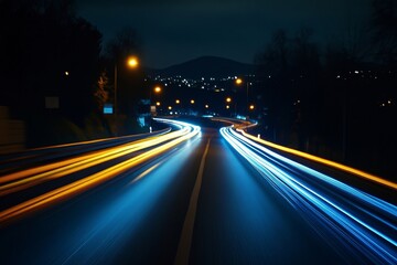 Blue lines of car speed lights on black background. High quality photo