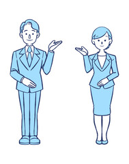 案内をするスーツを着た男女