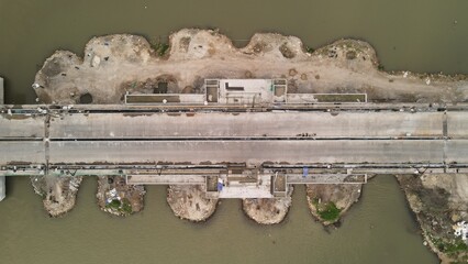 Aerial view of the construction of the Pandansimo Bridge, which connects the southern Java route,...