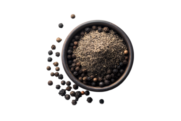 Black peppercorns and ground pepper in a bowl
