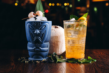 Refreshing cold Tiki Drink Cocktail with coconut and lychee © Илья Солдаткин