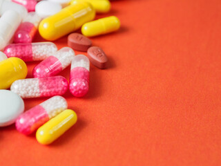 Macro Photography of Different Pills in the Background: A Visual Representation of Drugs and Their Role in the Pharmaceutical Industry.