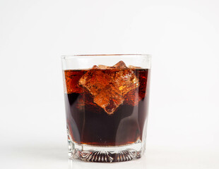 Cola with Ice Cubes on a White Background | Refreshing Cola Drink.