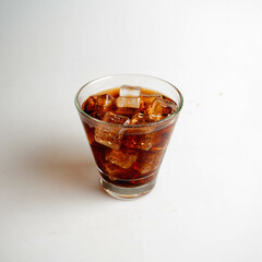 Cola with Ice Cubes on a White Background | Refreshing Cola Drink.