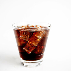 Cola with Ice Cubes on a White Background | Refreshing Cola Drink.