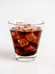 Cola with Ice Cubes on a White Background | Refreshing Cola Drink.