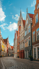 Obraz premium Historic Gothic Cathedral Tower in Prague Old Town Square with Brick Architecture and Medieval Castle Skyline