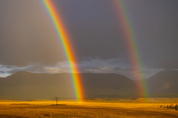 Majestic double rainbow over Altai mountains, Russia, stunning landscape