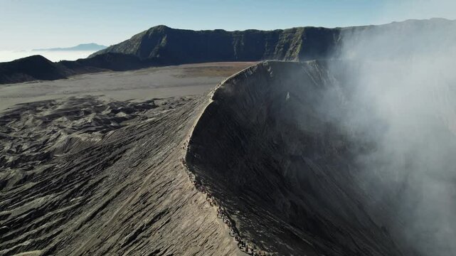 Mount bromo crater emitting smoke in east java, indonesia