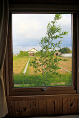 A Picturesque Rural Landscape Through a Window’s Embrace, Biei, Hokkaido, Japan