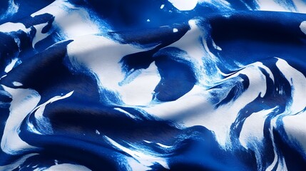 Serene and graceful Japanese inspired fabric pattern featuring a dynamic abstract design of flowing indigo dyed waves and ripples
