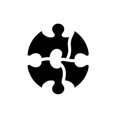 A simplistic monochrome graphic of a jigsaw puzzle in the shape of a circle, illustrating unity and interconnectedness against a clean white background, with a subtle shadow.