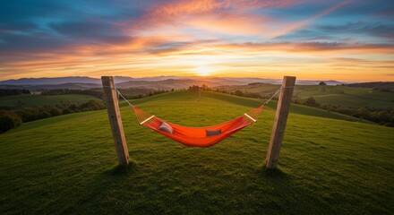 Fototapeta premium Relaxing in Hammock at Sunset Over Rolling Hills Landscape