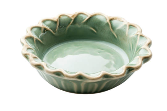 Elegant green ceramic bowl with scalloped edges on a minimalist white background isolated on transparent background