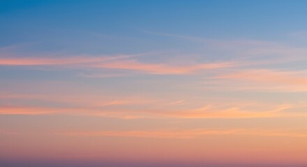 Obraz premium Sky at Sunset with Pastel Colors and Soft Clouds Background