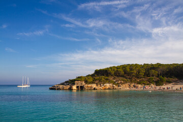 a beautiful ship is sailing in the blue sea