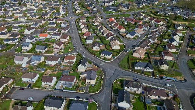 Amazing panoramic drone view of a suburban Saint-Berthevin area with a dense layout of houses and streets, Mayenne in France.