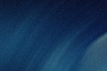 A grainy blue background with subtle light variations and a hint of a light beam on the right side