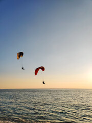beautiful landscape with a view of the sea flying on a paraglider