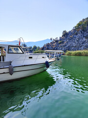 Fototapeta premium a beautiful ship is sailing in the blue sea